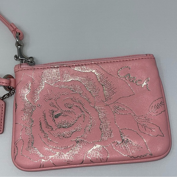 Coach pink wristlet with silver embossed flower - Picture 12 of 13